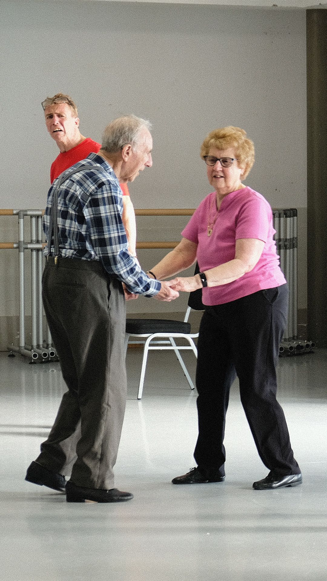 Dancers holding hands in Parkinson's dance class